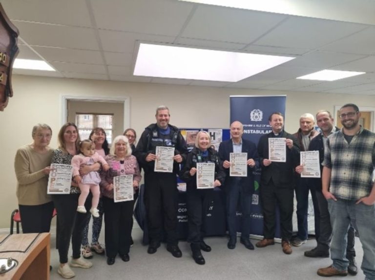 PCSO May and Webb, with users, at the launch of Hate Crime week at the Broadway Centre